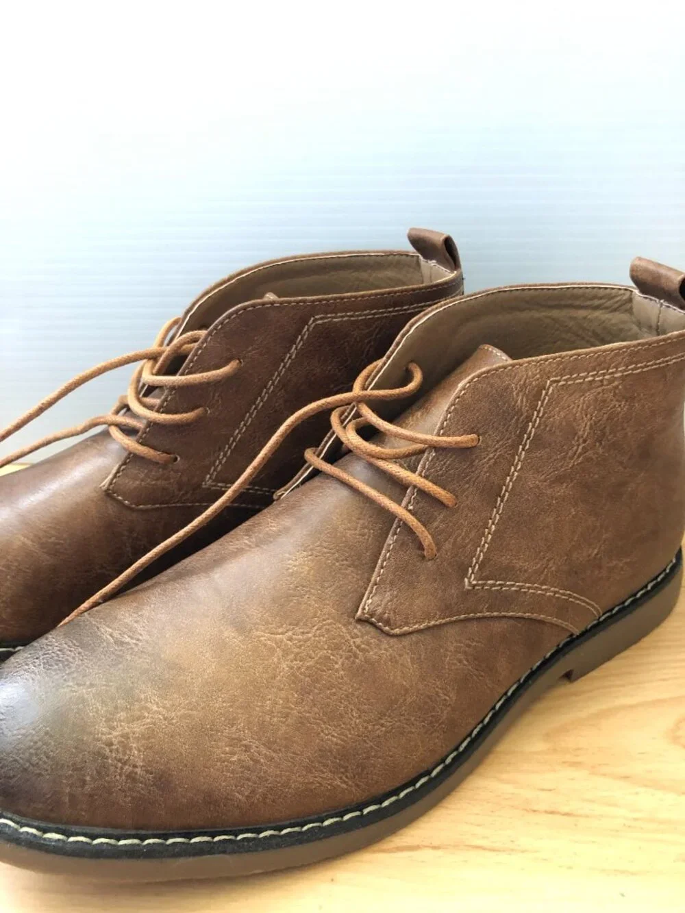 metro charm. Brown lace up booties